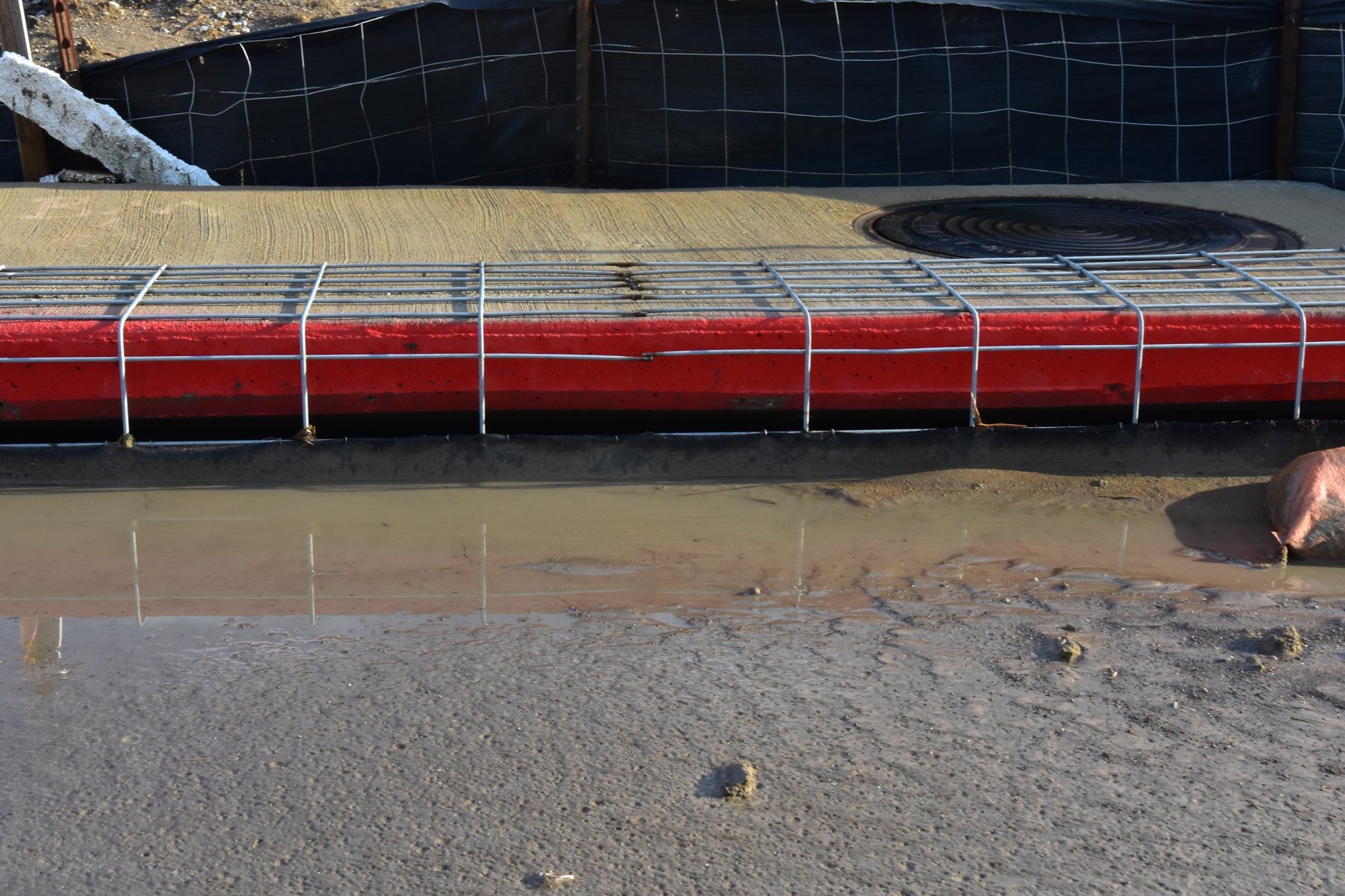Close-up of a dewatering tube filtering pumped water on site