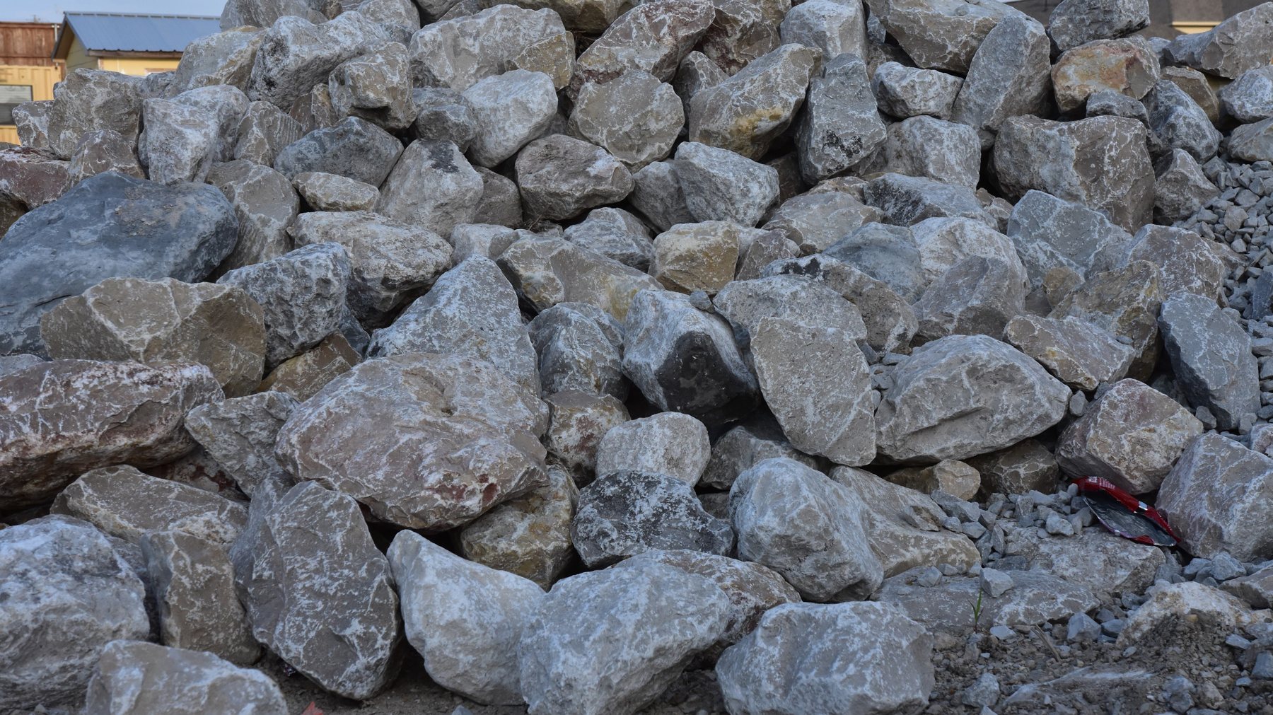 Washed aggregate stone used to redress a construction entrance