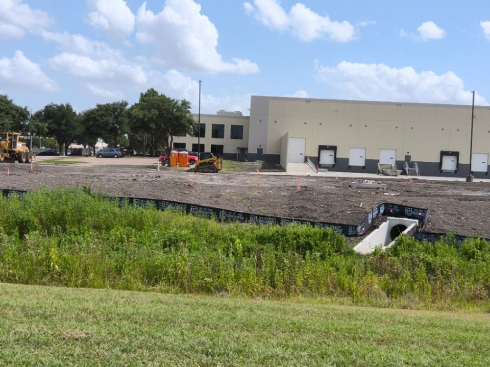 Terradyne branded silt fence and a culvert outfall at a Garland industrial build