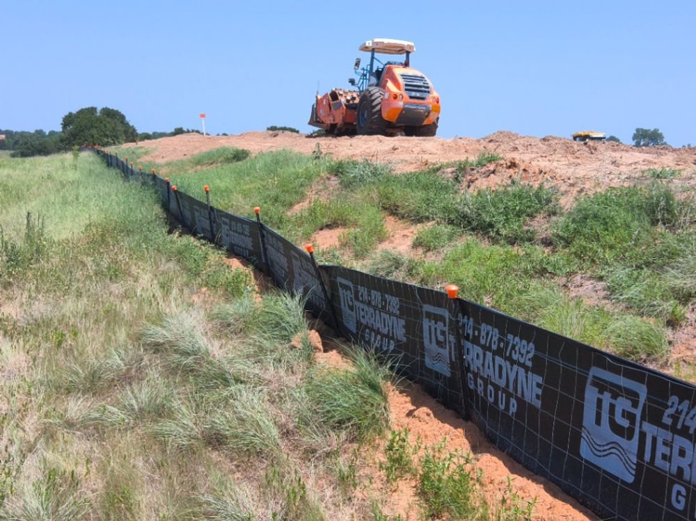 Terradyne branded silt fence running a ridgeline on a Grayson County earthwork site