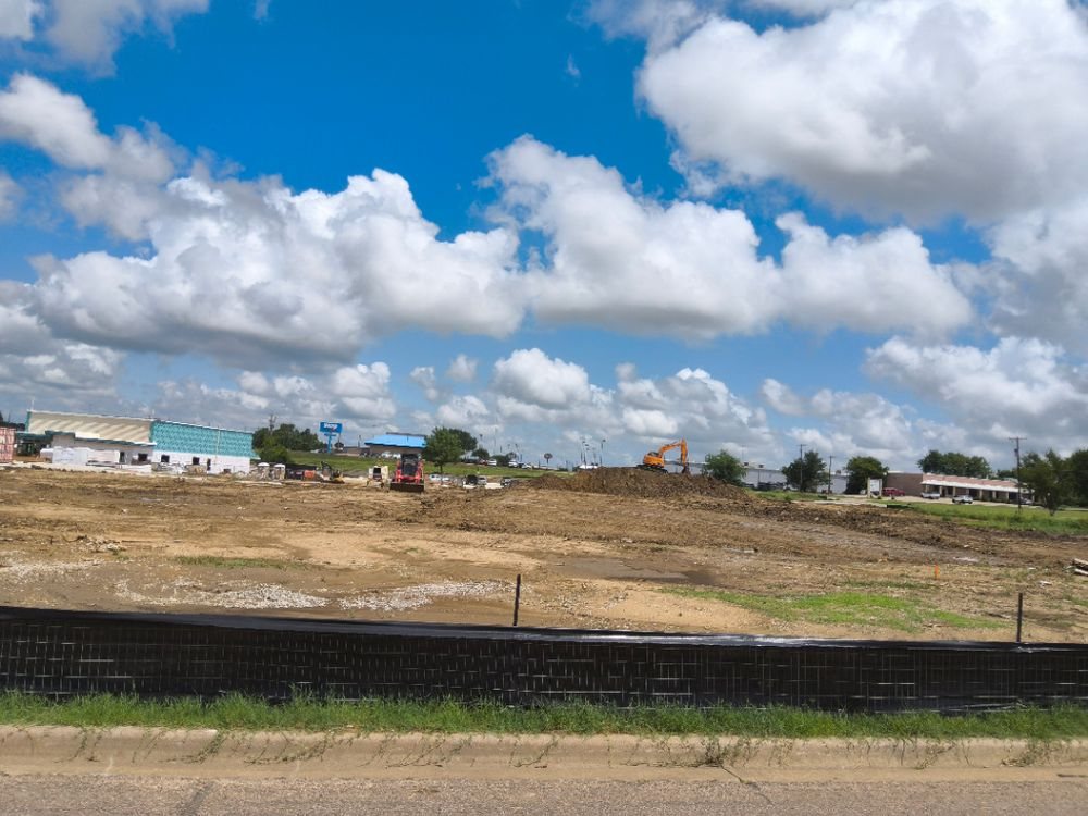 Silt fence along the road frontage of an active Sherman earthwork site