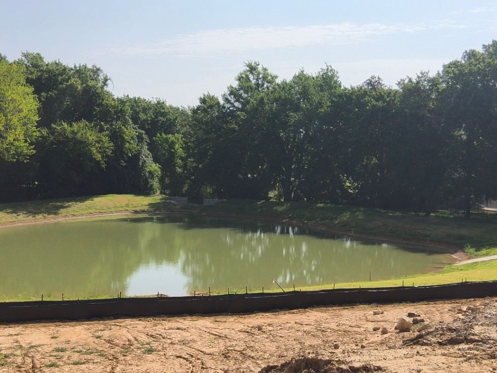 Silt fence protecting a detention pond on a Southlake development