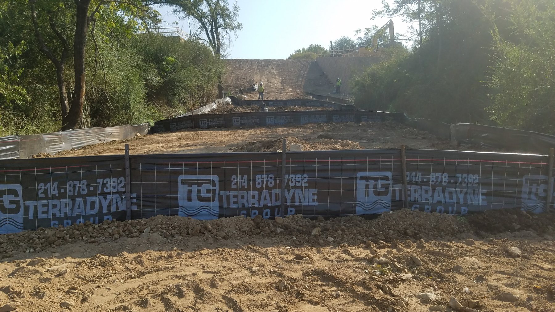 Perimeter fence line on a graded pad at demobilization